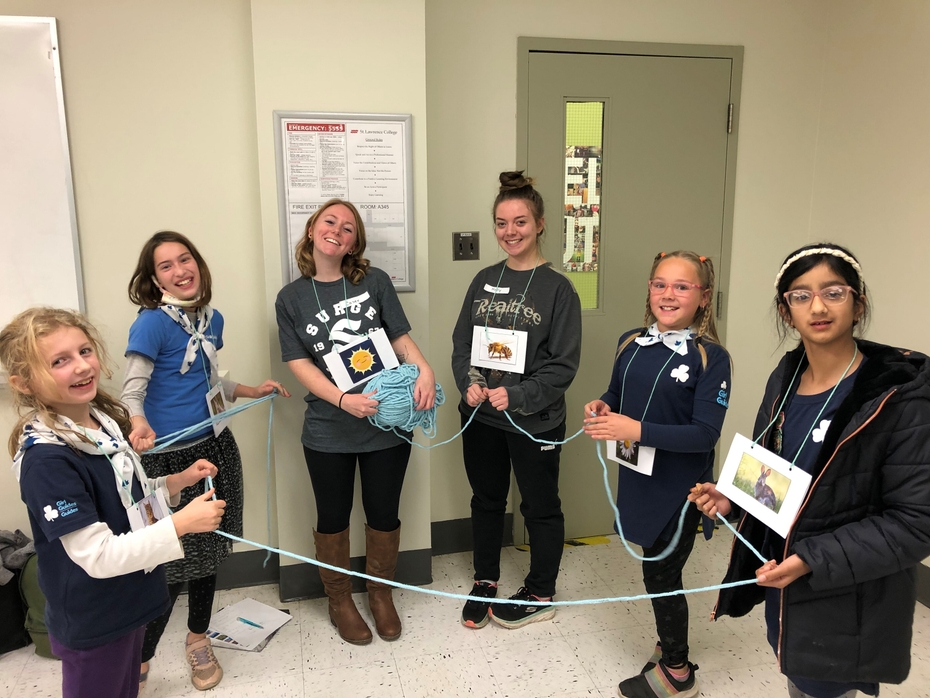 Environmental Technician students teach Girl Guides about food webs inside an SLC classroom 